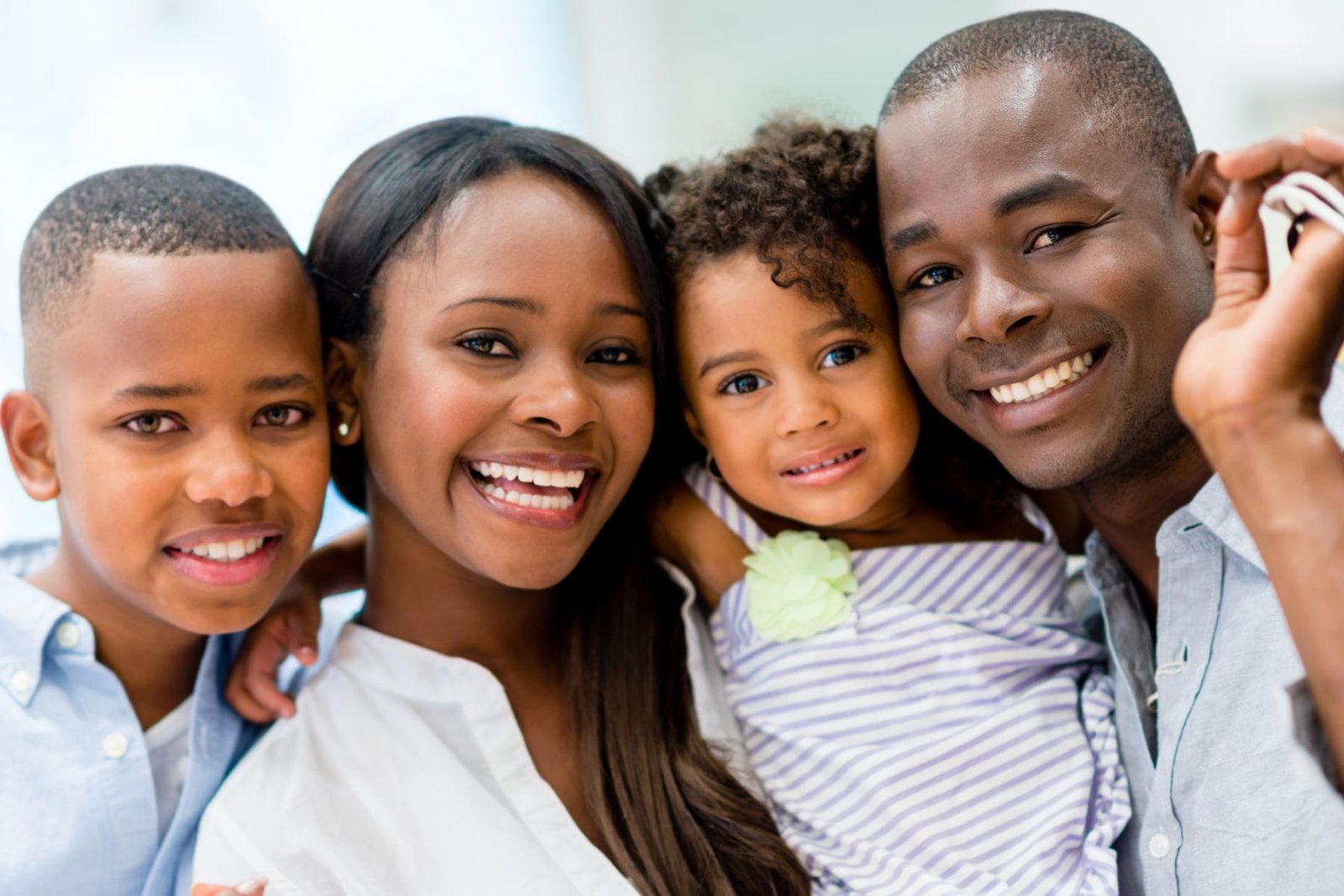 A smiling family of four